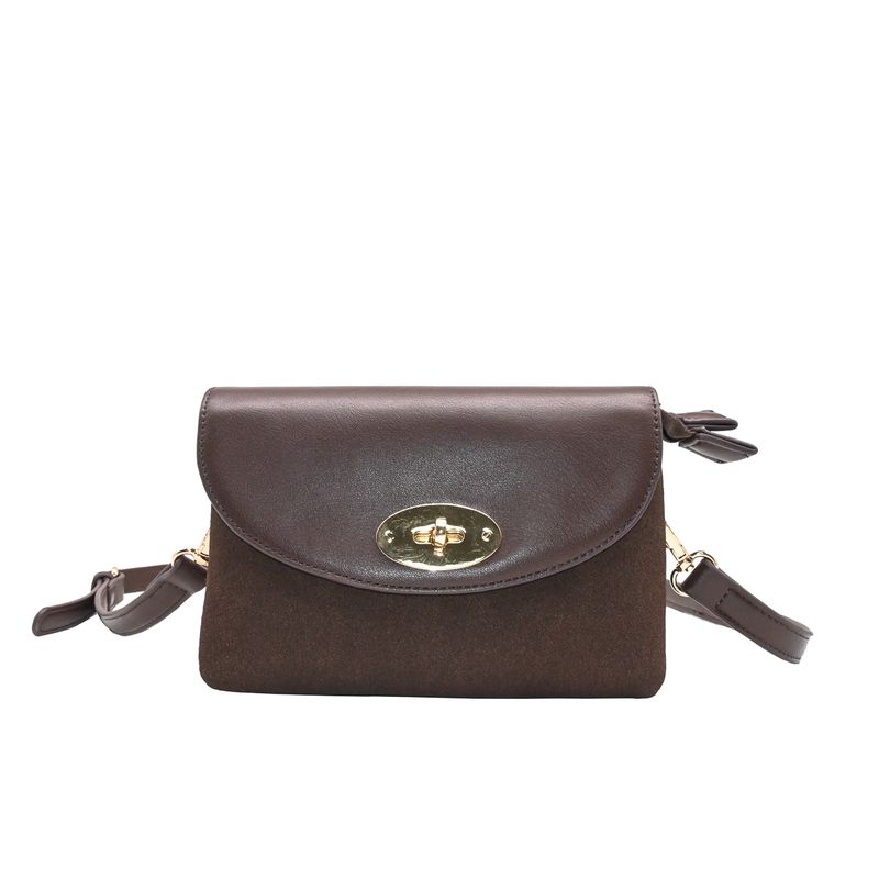 DANIELLE clutch med semsket look - brun